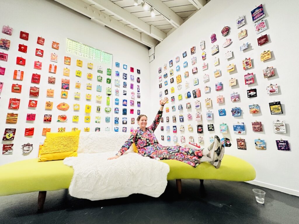 Jackie Simion models the rainbow wall. (David Downs)